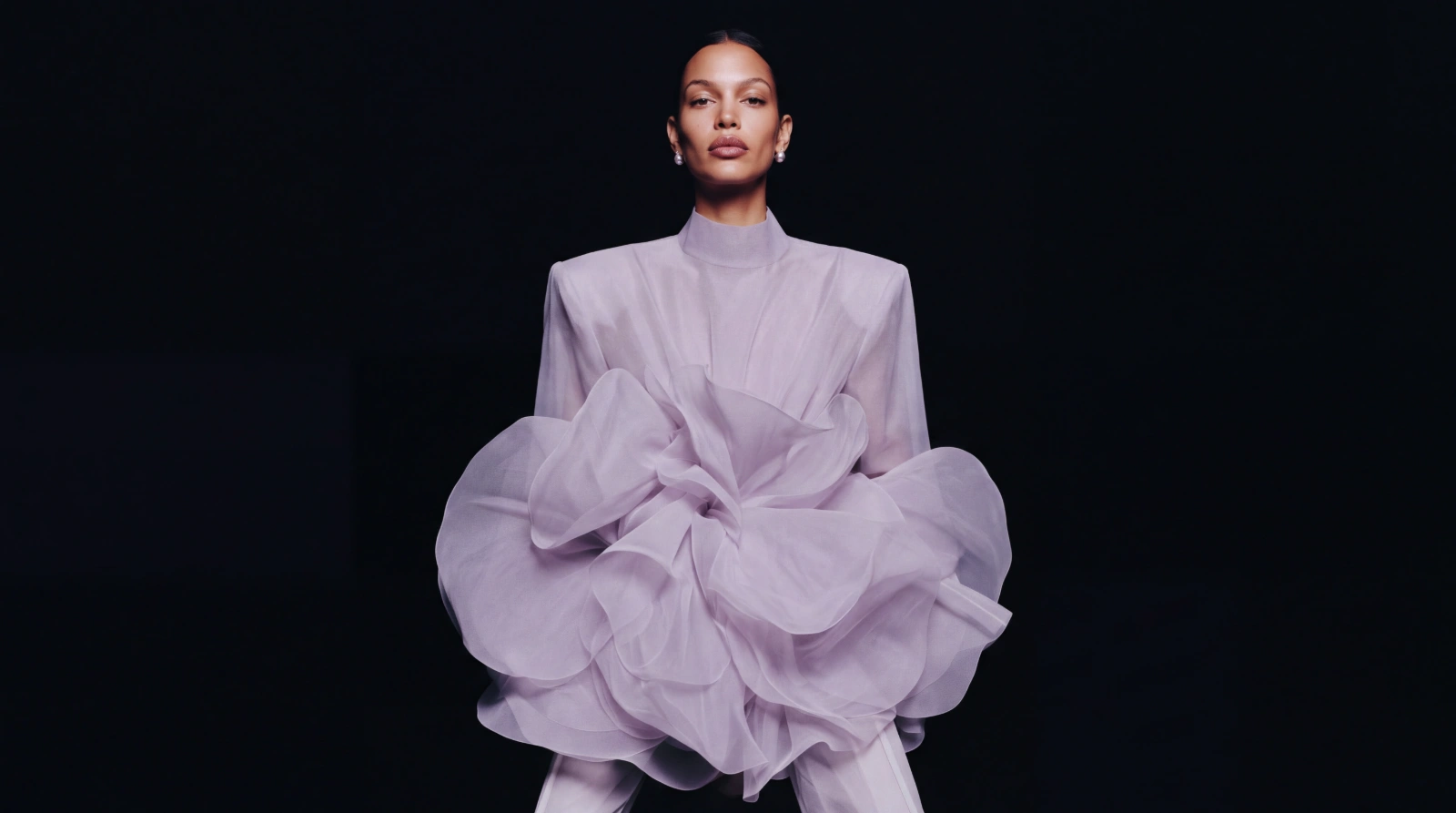 The lilac organza couture look in full, with oversized ruffled volume